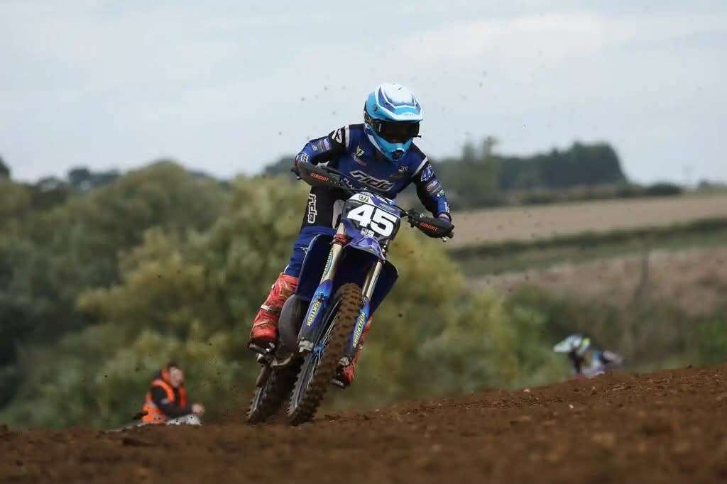 Harley Pastoor racing over a rise on his number 45 motocross bike